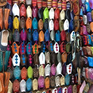 Babouches galore and other leather goods of the souk, Marrakech, Morroco…