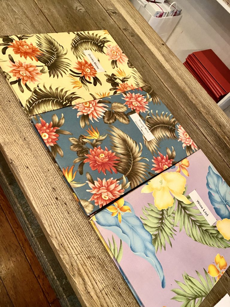 The Ivy menus, floral covers