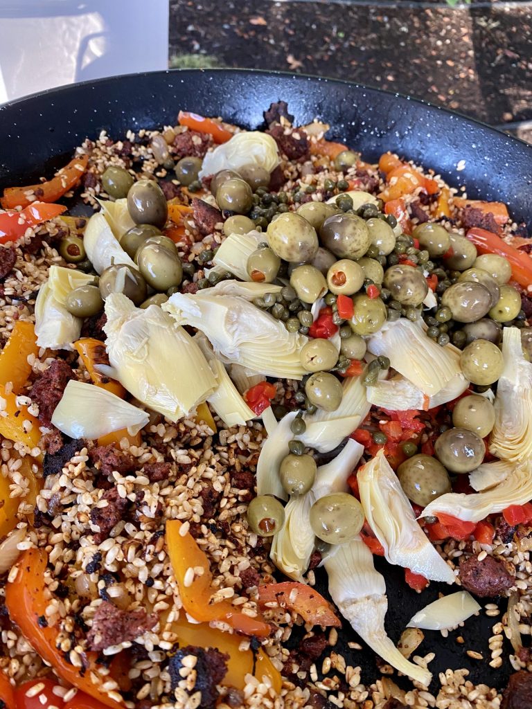 Paella, master paella recipe, bomba rice, sweet peppers, olives, Spanish olives, chorizo sausage, capers, artichoke hearts,