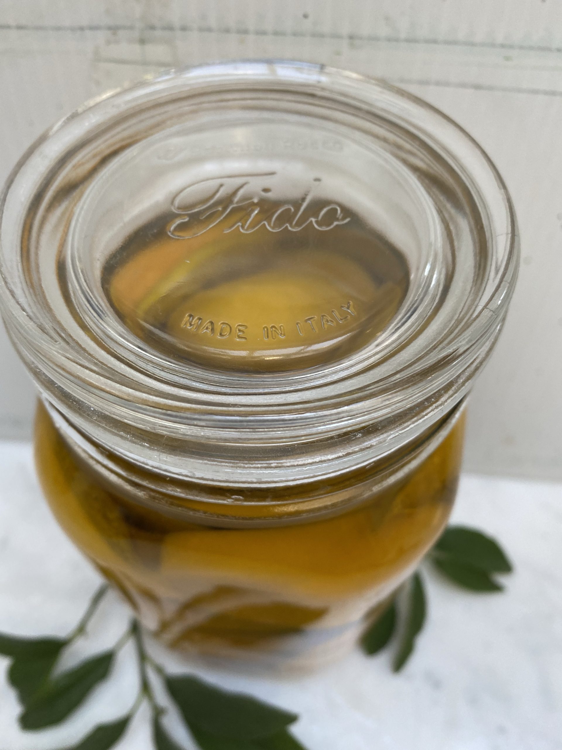 preserved lemon recipe, lemons, organic lemons, lemon quarters, fido jars, fido canning jars, olive oil