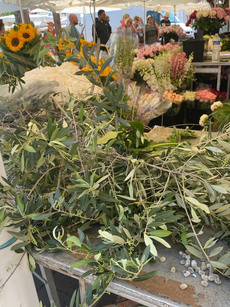 Marché aux fleurs, Nice, Cours Saleya, Cours Saleya flower market, pink peonies, fresh cut flowers, fresh cut flower arrangements, olive branches