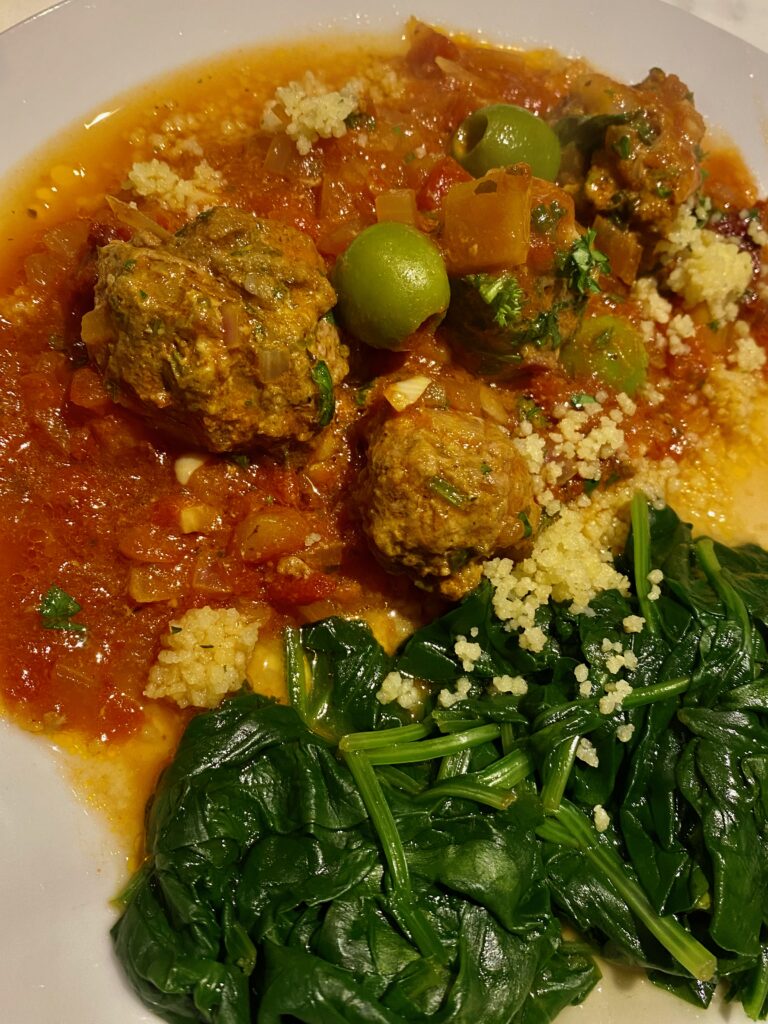 Tagine recipe, kefta recipe, moroccan meatballs, spicy, smoky sauce, spicy smoky tomato sauce, tagine, North African cuisine, Kefta Mkauouara, green olives, cous cous, spinach 