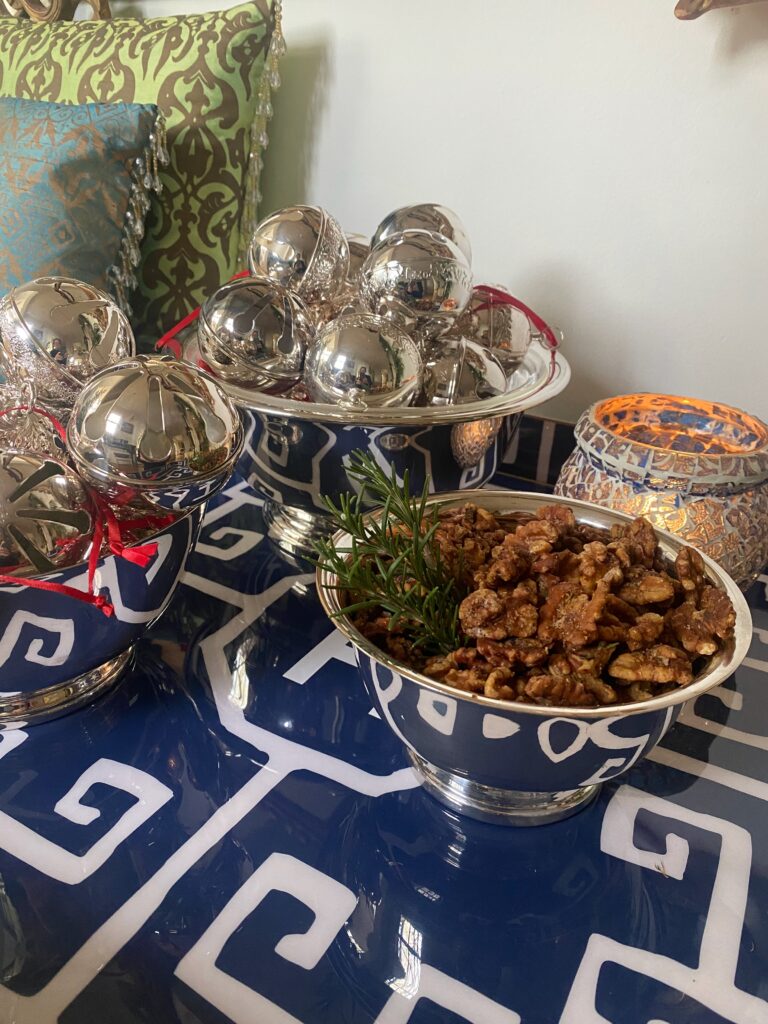 Silver sleigh bells, silver bowls, silver nut bowl, savory walnuts, rosemary
