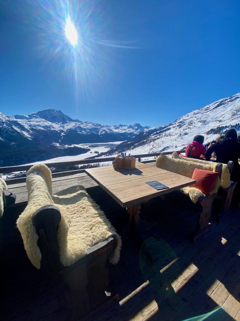 Paradiso club, Saint Moritz, après ski, shearling seat covers, The alps, elegant food in a rustic setting, alfresco dining, indoor-outdoor living, slate table signs