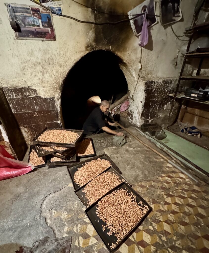 Souk, Marrakech, Medina, wood burning stove, almonds roasting
