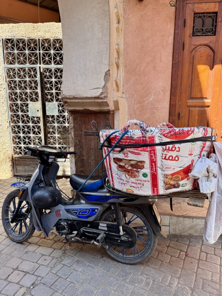 Souk, Marrakech, Medina, motorcycle with basket on back